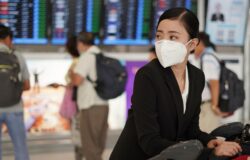 China to end quarantine for international travelers