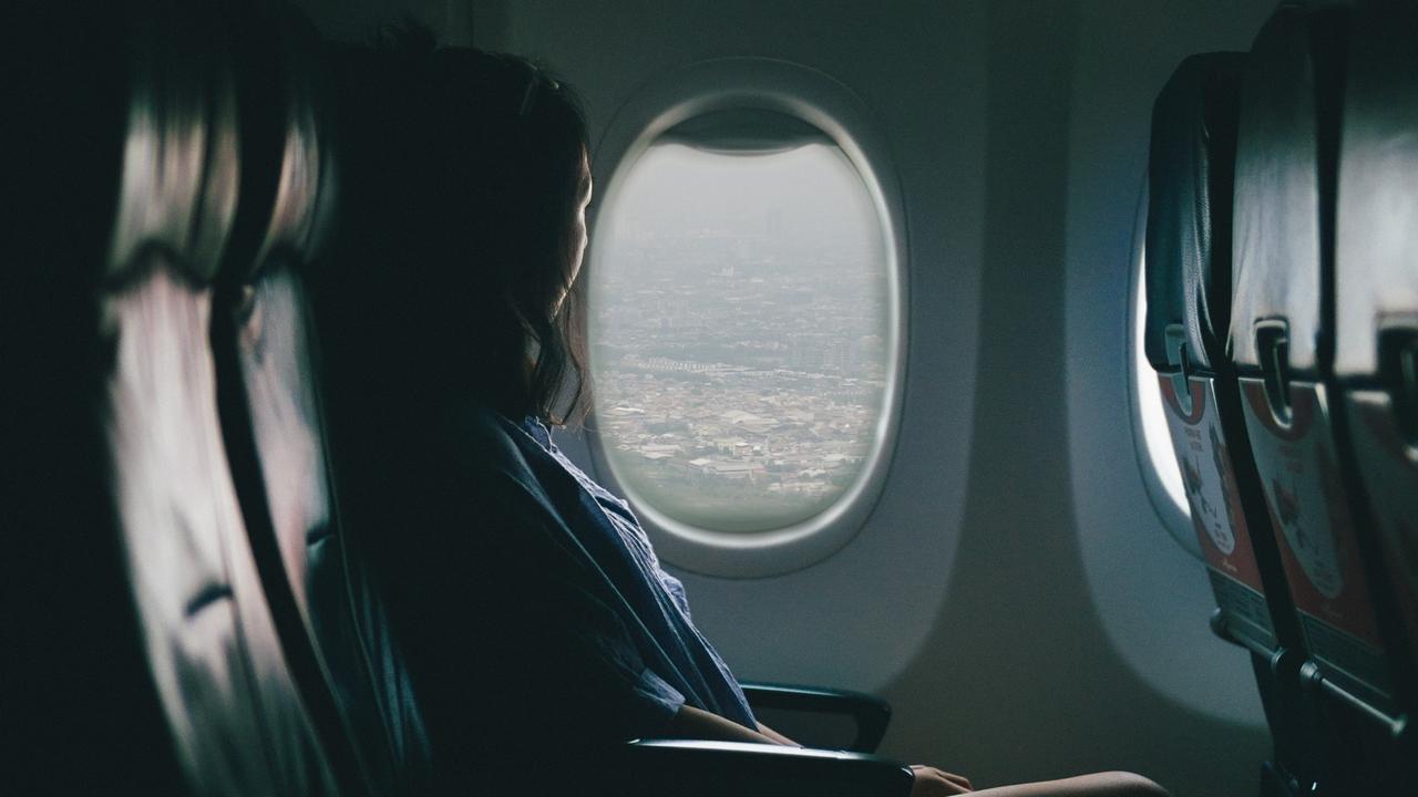 Woman in plane